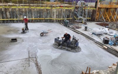 Réalisation de sols en béton lissés avec des truelles mécaniques